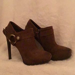 Guess, brown heeled boots.
